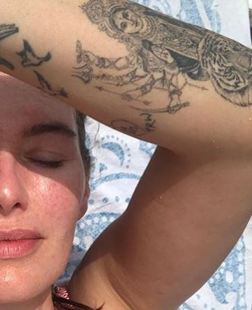 Sue Headey’s daughter, Lena Headey flaunting her tattoos.